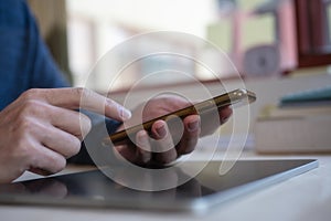 Social media marketing concept. Man hand using smartphone typing, chatting