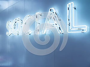 Social Media Type font Neon Signage on wall Blue tonel