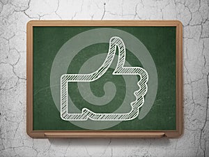 Social network concept: Thumb Up on chalkboard