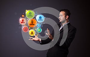 Social network icons in the hand of a businessman