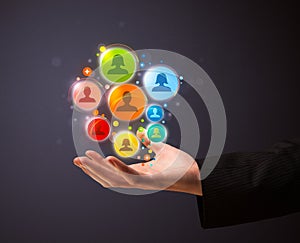 Social network icons in the hand of a businessman