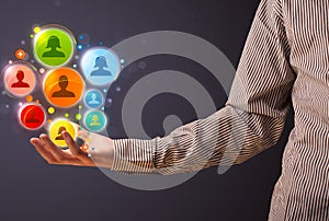 Social network icons in the hand of a businessman