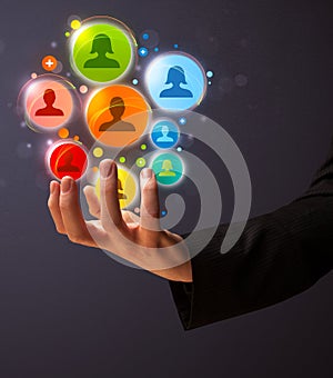 Social network icons in the hand of a businessman