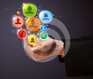 Social network icons in the hand of a businessman