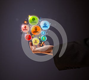 Social network icons in the hand of a businessman