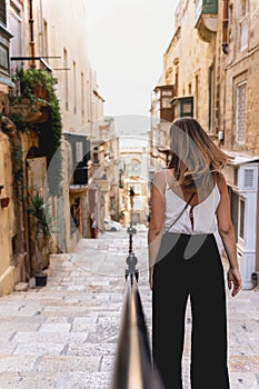 Social network style pictures of a woman exploring the beauty of La Valletta in Malta