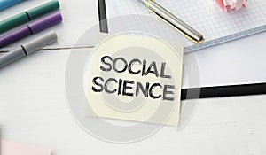 Social science memo written on a notebook