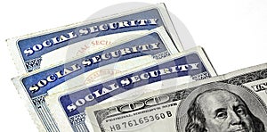 Social Security Cards Representing Finances and Retirement with Money