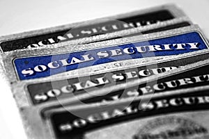 Social Security Cards in a Row Pile for Retirement