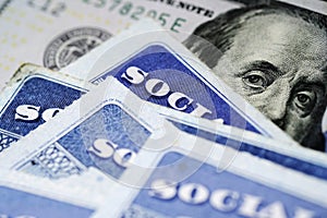 Social Security Cards with US One Hundred Dollar Bill $100