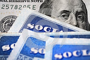 Social Security Cards with US One Hundred Dollar Bill $100