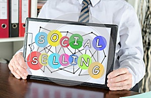 Social selling concept on a clipboard