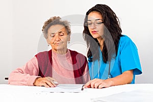 Social Service Provider Helping Elderly photo