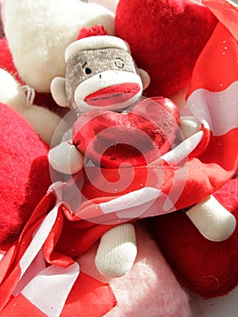 Sock monkey with red sparkly heart, spread & celebrate love, VALENTINES