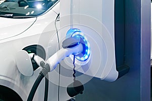 Socket for electrical car battery charger with load indicator li