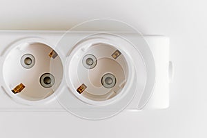 Socket pads for extension cords and surge protectors on a white background.