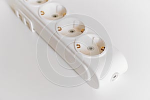 Socket pads for extension cords and surge protectors on a white background.