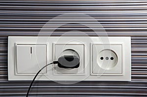 Socket with recharging device