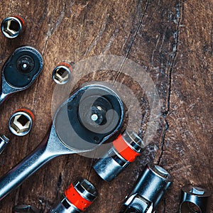 Socket Spanner Wrenches on wooden Background for mechanical tool