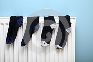 Socks drying on a radiator