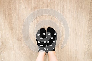 Socks White Color Dot in Black Pattern Top View. Portrait of Beautiful Young Woman Wearing Black Polka Dot Socks on Wooden Floor B