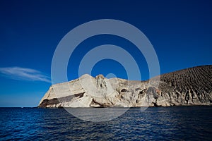 Socorro San Benedicto Island and volcano in ocean photo