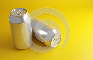 Soda cans on yellow background