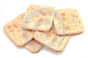 Soda cracker stack closeup, large detailed isolated square crisp whole grain saltine crackers macro closeup, military field ration