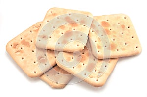 Soda cracker stack closeup, large detailed isolated square crisp whole grain saltine crackers macro closeup, military field ration photo