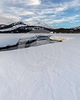 Soda Creek Meanders through a Snow Covered Meadow in Deschutes N