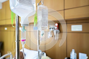 Sodium chloride or saline solution fluid iv irrigation transparent drip bag and tubing at room in hospital