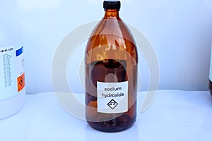 Sodium hydroxide in bottle, chemical in the laboratory