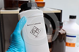 Sodium hydroxide in bottle, chemical in the laboratory