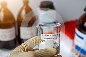 sodium sulfate anhydrous in glass, chemical in the laboratory