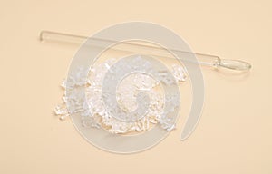 Sodium thiosulfate or sodium thiosulphate on beige background