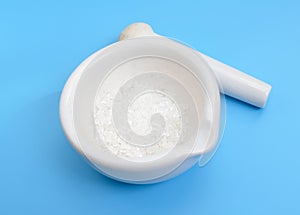 Sodium thiosulfate or sodium thiosulphate on blue background