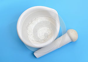 Sodium thiosulfate or sodium thiosulphate on blue background