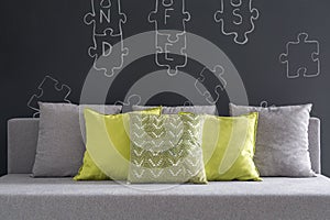 Sofa with green cushions