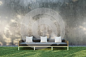 The sofa is located in the garden on the grass. The back is a bare cement wall. 3D illustration. photo