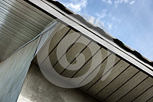 Soffit for providing optimal ventilation for roof overhangs photo