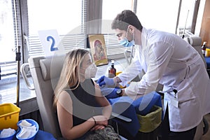 A woman getting her jab at the hospital