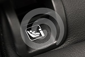 SOFIX sign on black leather background. ISOFIX for child car seats - Image photo