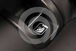 SOFIX sign on black leather background. ISOFIX for child car seats - Image photo