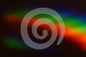 Soft abstract rainbow light forming smooth waves