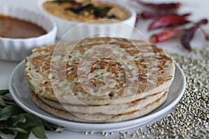 Soft Bajra Dosa. Soft and spongy pancakes made of fermented batter of pearl millet and lentils. Served with spicy coconut