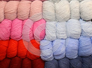 Soft balls of colored wool to create handmade sweaters