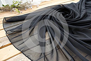 Soft black chiffon fabric curves photo
