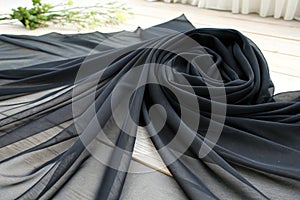 Soft black chiffon fabric curves photo