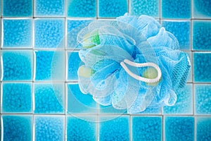 Soft blue bath puff or sponge