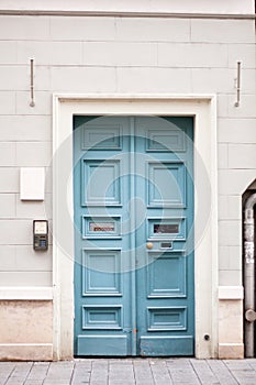 soft blue door on the building